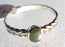Mana NZ - Women's Small Round Greenstone Ring set in Stirling Silver (S1/2)